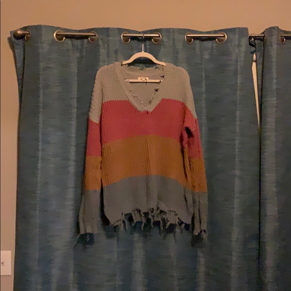 Distressed sweater
